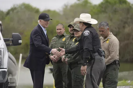President Joe Biden talks with the U.S. Border Patrol and local officials, as he looks over the southern border, Feb. 29, 2024, in Brownsville, Texas, along the Rio Grande. (AP Photo/Evan Vucci, File)