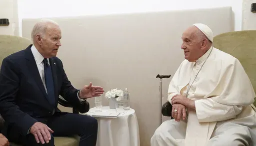 President Joe Biden, left, meets with Pope Francis in Savelletri, Puglia, Italy, June 14, 2024. (Kevin Lamarque/Pool Photo via AP, File)