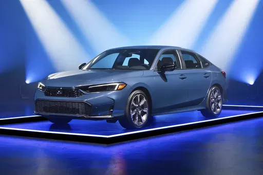This photo provided by Edmunds shows the 2025 Honda Civic. The hybrid version of the Civic is the Edmunds Top Rated Car for 2025 thanks to its upscale feel and excellent fuel economy. (Courtesy of Edmunds via AP)