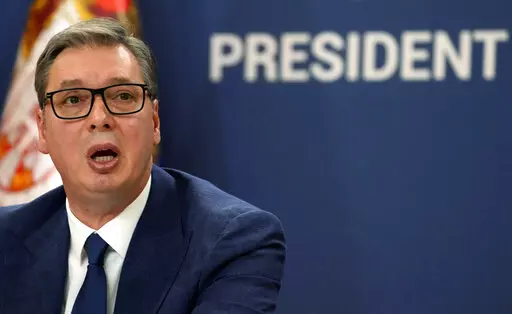 Serbian President Aleksandar Vucic addresses the nation at a news conference in Belgrade, Serbia, Sunday, Aug. 21, 2022. Vucic has called on NATO on Sunday to "do their job" in Kosovo, or Serbia will have to protect its minority in the breakaway province. Address to his nation by Aleksandar Vucic followed the collapse of political talks between Serbian and Kosovo leaders mediated earlier this week by the European Union in Brussels. (AP Photo/Darko Vojinovic)