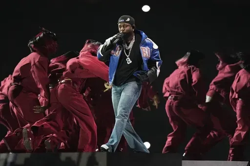 Kendrick Lamar performs during halftime of the NFL Super Bowl 59 football game between the Kansas City Chiefs and the Philadelphia Eagles, Sunday, Feb. 9, 2025, in New Orleans. (AP Photo/Frank Franklin II)