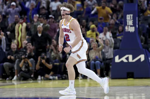 Golden State Warriors guard Brandin Podziemski (2) celebrates against the New Orleans Pelicans during the first half of an NBA basketball game in San Francisco, Tuesday, Oct. 29, 2024. (AP Photo/Jed Jacobsohn)