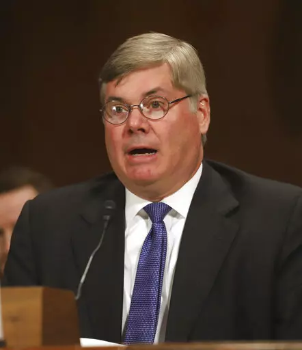 FILE -Robert R. Summerhays, President Donald Trump's nominee for District Judge for the Western District of Louisiana gives testimony during a U. S. Senate Judiciary Committee Hearing on Capitol Hill in Washington on Wednesday, April 11, 2018. Robert R. Summerhays, a federal judge hears arguments Friday, May 13, 2022  on whether the Biden administration can lift pandemic-related restrictions on immigrants requesting asylum later this month.(AP Photo/Harry Hamburg, File)