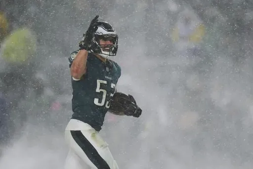 Philadelphia Eagles linebacker Zack Baun celebrates after recovering a fumble by Los Angeles Rams quarterback Matthew Stafford during the second half of an NFL football NFC divisional playoff game Sunday, Jan. 19, 2025, in Philadelphia. (AP Photo/Matt Slocum)