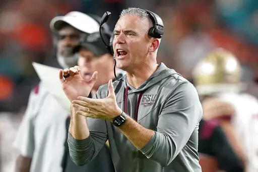 Florida State head coach Mike Norvell watches from the sideline during the second half of an NCAA college football game against Miami, Saturday, Nov. 5, 2022, in Miami Gardens, Fla.(AP Photo/Lynne Sladky)