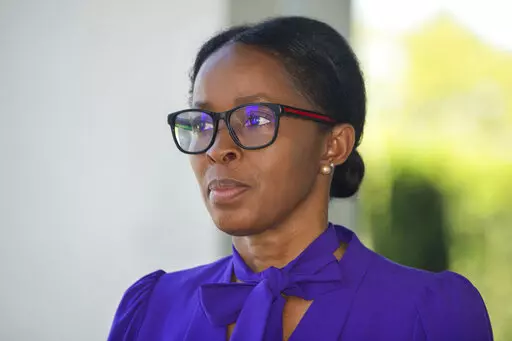 This April 8, 2021 photo shows Sharon Lewis. The associate athletic director who filed a $50 million racketeering lawsuit and a state court suit against Louisiana State University is no longer working there, and her lawyers said she was fired in retaliation. Sharon Lewis has claimed in state and federal lawsuits that she was denied pay raises and was verbally abused after reporting that former football coach Les Miles had sexually harassed female student workers and made racist remarks. (Travis 