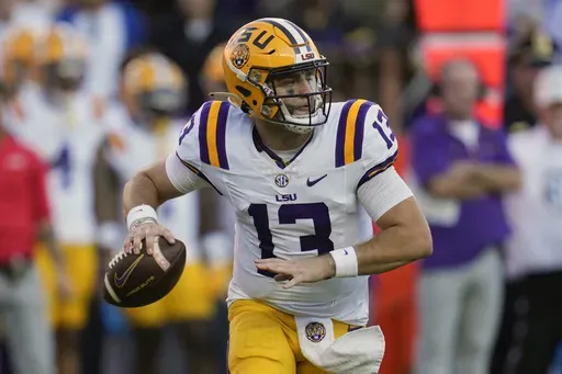 LSU quarterback Garrett Nussmeier looks for a receiver during the first half of an NCAA college football game against Florida, Saturday, Nov. 16, 2024, in Gainesville, Fla. (AP Photo/John Raoux)