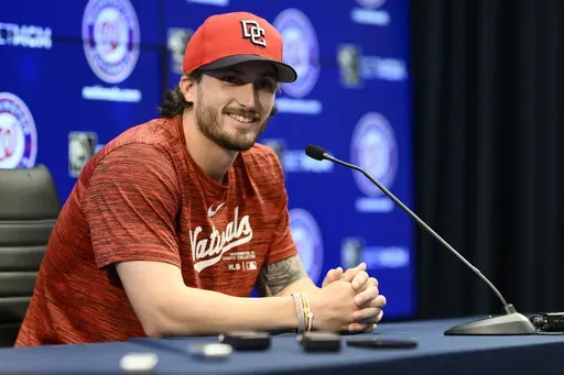 Washington Nationals' Dylan Crews talks to the media during a news conference before a baseball game between the Nationals and the New York Yankees, Monday, Aug. 26, 2024, in Washington. (AP Photo/Nick Wass)