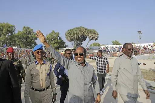 Somalia President Hassan Sheikh Mohamud leads a demonstration at Banadir stadium, Mogadishu, Thursday Jan. 12, 2023. The government rally encouraged an uprising against the al-Shabab group amid a month-long military offensive. The African Union appealed for nearly $90 million Wednesday, March 22, 2023, for its peacekeeping force in Somalia, which is providing support to its military forces battling al-Shabab extremists. (AP Photo/Farah Abdi Warsameh, File)