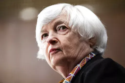 Treasury Secretary Janet Yellen testifies before the Senate Banking, Housing, and Urban Affairs Committee hearing, May 10, 2022, on Capitol Hill in Washington. The U.S. will close the last avenue for Russia to pay back its billions in debt to international investors on Wednesday, making a Russian default on its debts for the first time since the Bolshevik Revolution all but inevitable. The Treasury Department said in a notification Tuesday that it does not plan to renew the license to allow Russ