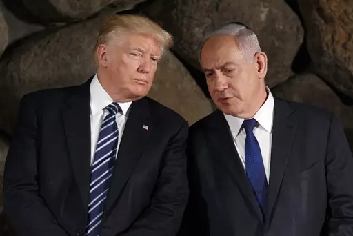 President Donald Trump, left, talks with Israeli Prime Minister Benjamin Netanyahu during a ceremony, May 23, 2017, in Jerusalem. Former President Donald Trump offered a tough message to Israel over its war against Hamas on Thursday, April 4, 2024, urging the country to "Get it over with." In an interview with conservative radio host Hugh Hewitt, Trump said that Israel is "absolutely losing the PR war," and called for a swift resolution to the bloodshed. (AP Photo/Evan Vucci, File)