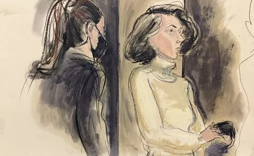 Ghislaine Maxwell, right, sits with her mask off during a break in her sex trafficking trial, Monday, Dec. 20, 2021, in New York. (Elizabeth Williams via AP)