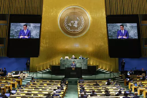 President of Spain Pedro Sanchez, center bottom, addresses the 77th session of the United Nations General Assembly at U.N. headquarters, Thursday, Sept. 22, 2022. (AP Photo/Jason DeCrow)