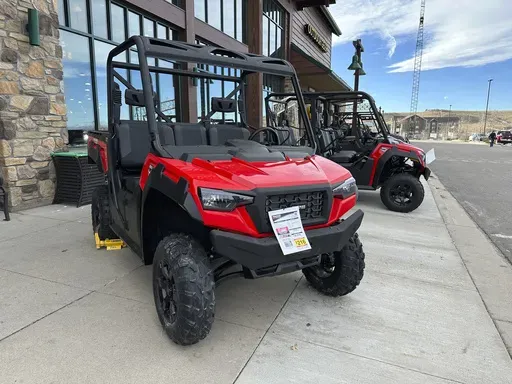 Off-road vehicles sit on display outside a Cabela's sporting goods store Sunday, Dec. 8, 2024, in Lone Tree, Colo. (AP Photo/David Zalubowski)