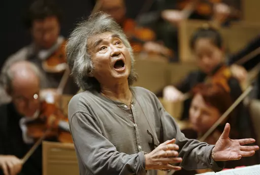 Former Director of the Boston Symphony Orchestra Seiji Ozawa conducts the orchestra during a rehearsal of Berlioz's "Symphonie Fantastique," at Symphony Hall, in Boston, on Nov. 26, 2008. World-renowned conductor Ozawa has died of heart failure at his home in Tokyo, his management office said Friday, Feb. 9, 2024. He was 88. (AP Photo/Steven Senne, File)