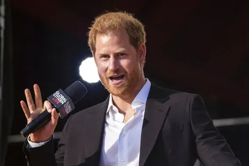 Prince Harry, Duke of Sussex, speaks during the Global Citizen festival on Sept. 25, 2021 in New York. Lawyers for Prince Harry told a court hearing on Friday that the British royal is unwilling to bring his children to his homeland because it is not safe. Harry has launched a legal challenge to the U.K. government’s refusal to let him personally pay for police protection when he comes to Britain. His legal team says Harry wants to bring his children — Archie, who is almost 3, and 8-month-ol
