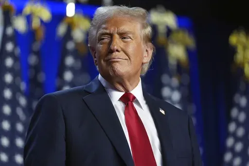 Republican presidential nominee former President Donald Trump arrives at an election night watch party at the Palm Beach Convention Center, Wednesday, Nov. 6, 2024, in West Palm Beach, Fla. (AP Photo/Evan Vucci)