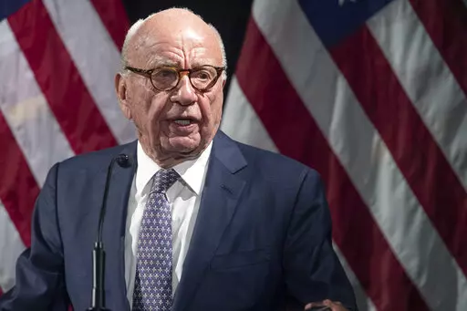 Rupert Murdoch introduces Secretary of State Mike Pompeo during the Herman Kahn Award Gala, Oct. 30, 2019, in New York. Murdoch, chairman of Fox Corp., acknowledged in a deposition that some Fox News commentators endorsed the false allegations by former President Donald Trump and his allies that the 2020 presidential election was stolen and that he did not step in to stop them from promoting the claims. The documents unsealed Monday, Feb. 27, 2023, are at the heart of a defamation lawsuit agains