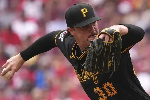 Pittsburgh Pirates' Paul Skenes delivers a pitch during the fourth inning of a baseball game against the Cincinnati Reds, Sunday, Sept. 22, 2024, in Cincinnati. (AP Photo/Kareem Elgazzar)