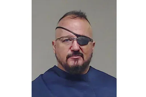 This photo, provided by the Collin County Sheriff's Office shows Stewart Rhodes. A federal judge refused on Friday, Feb. 18, 2022, to free Oath Keepers founder Rhodes from jail while he awaits trial on charges that he plotted with other members of his far-right militia group to attack the U.S. Capitol to stop Congress from certifying President Joe Biden's electoral victory. (Collin County Sheriff's Office via AP, File)