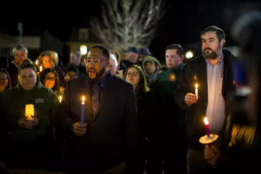 Newport News Councilman Elect John Eley, South District 3, speaks at a candlelight vigil in honor of Richneck Elementary School first-grade teacher Abby Zwerner at the School Administration Building in Newport News, Va., Monday, Jan. 9, 2023. Eley served on the Newport News School Board before being elected a councilman. Zwerner was shot and wounded by a 6-year-old student while teaching class on Friday, Jan. 6. (AP Photo/John C. Clark)