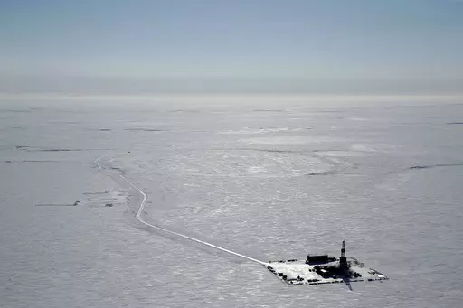 This 2019 aerial photo provided by ConocoPhillips shows an exploratory drilling camp at the proposed site of the Willow oil project on Alaska's North Slope. The Biden administration’s approval of the massive oil development in northern Alaska on Monday, March 13, 2023, commits the U.S. to yet another decadeslong crude project even as scientists urgently warn that only a halt to more fossil fuel emissions can stem climate change. (ConocoPhillips via AP, File)