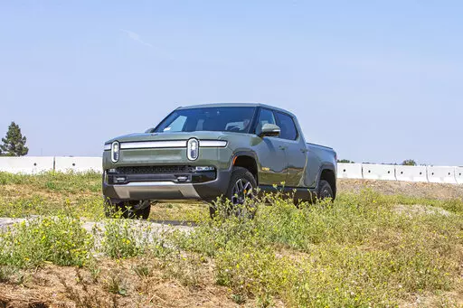 This photo, provided by Edmunds, shows the 2022 Rivian R1T. It is an all-electric pickup truck with an EPA-estimated range of 314 miles in its initial configuration. (Rex Tokeshi-Torres/Courtesy of Edmunds via AP)