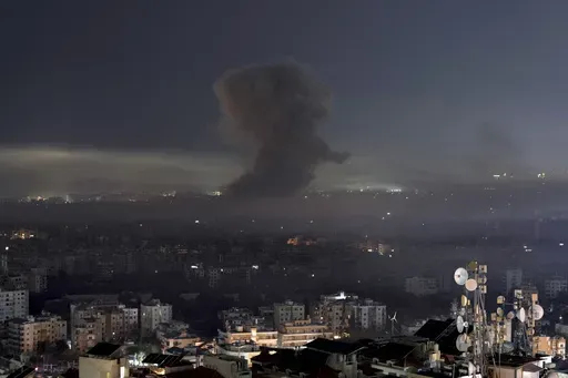 Smoke rises after an Israeli airstrike on Dahiyeh, in the southern suburb of Beirut, early Saturday, Nov. 9, 2024. (AP Photo/Bilal Hussein)