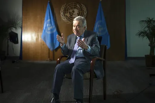 United Nations Secretary-General Antonio Guterres speaks during interview at the UN Headquarters, Thursday, Jan. 20, 2022, in New York. As he starts his second term as U.N. secretary-general, Antonio Guterres said Thursday the world is worse in many ways than it was five years ago because of the COVID-19 pandemic, the climate crisis and geopolitical tensions that have sparked conflicts everywhere -- but unlike U.S. President Joe Biden he thinks Russia will not invade Ukraine.(AP Photo/Robert Bum