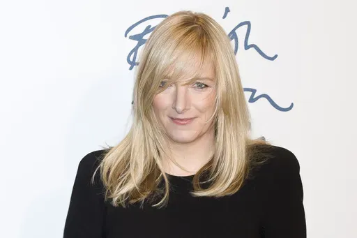 Sarah Burton arrives for the British Fashion Awards 2011 at a central London venue, on Nov. 28, 2011. French luxury fashion house Givenchy names Sarah Burton new creative director. (AP Photo/Jonathan Short, File)