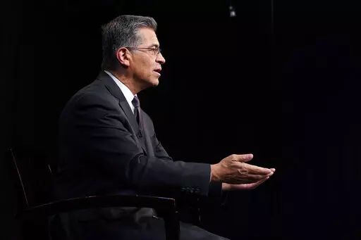 Health and Human Services Secretary Xavier Becerra, is interviewed by the Associated Press, Thursday, March 17, 2022, in Washington. (AP Photo/Jacquelyn Martin)