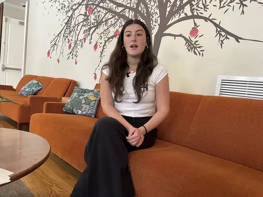 Eden Roth, a Jewish student at Tulane University in New Orleans, discusses tensions on campuses in the aftermath of the Hamas raid on Israel and Israel's response, at the Hillel Center in New Orleans on Tuesday, Nov. 7, 2023. (AP Photo/Kevin McGill)