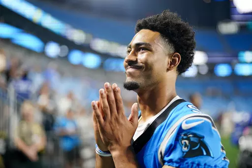 Carolina Panthers quarterback Bryce Young leaves the field after their loss against the Detroit Lions in a preseason NFL football game Friday, Aug. 25, 2023, in Charlotte, N.C. (AP Photo/Jacob Kupferman)