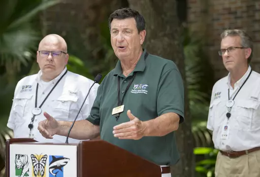 President and CEO of the Audubon Nature Institute Ron Forman, center, speaks during a news conference at the Audubon Zoo, July 14, 2018, in New Orleans. Forman, who is credited with transforming New Orleans’ Audubon Zoo from a wretched “animal prison” to a world-renowned showcase, will retire at the end of 2024, the Audubon Nature Institute announced Thursday, Aug. 17, 2023. (Brett Duke/The Times-Picayune/The New Orleans Advocate via AP, File)