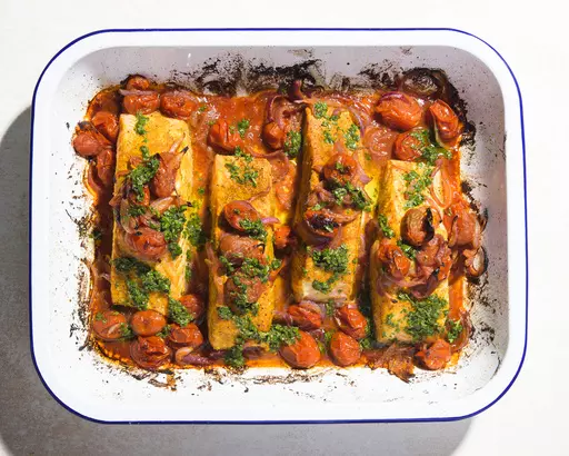 This image released by Milk Street shows a recipe for broiled curried salmon. (Milk Street via AP)