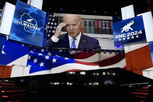 An image of President Joe Biden is projected on a screen during the final night of the 2024 Republican National Convention at the Fiserv Forum, Thursday, July 18, 2024, in Milwaukee. (AP Photo/Carolyn Kaster)