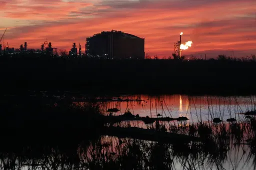 A flare burns at Venture Global LNG in Cameron, La., April 21, 2022. What would be the nation's largest export terminal for liquified natural gas won approval from a federal commission Thursday, June27, 2024 although when the southwest Louisiana project will be completed remains unclear in light of a Biden administration delay on such projects announced earlier this year. (AP Photo/Martha Irvine, File)