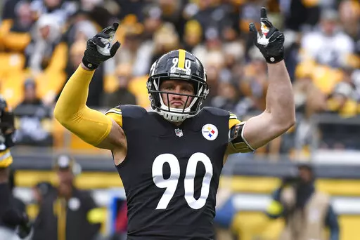 Pittsburgh Steelers linebacker T.J. Watt (90) encourages fans to make noise during the first half of an NFL football game against the New Orleans Saints in Pittsburgh, Sunday, Nov. 13, 2022. (AP Photo/Don Wright)