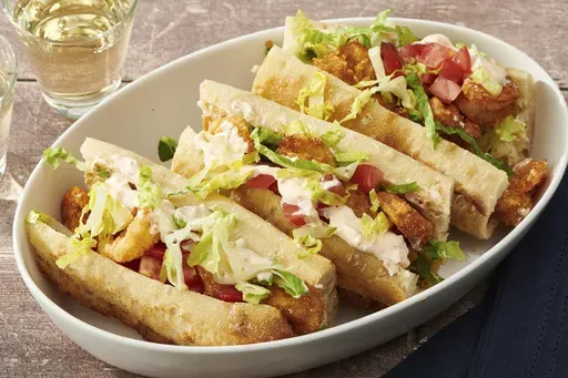 A recipe for shrimp po'boy sandwiches appears in New York on May 19, 2022. (Cheyenne Cohen via AP)