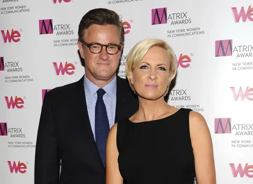 MSNBC's "Morning Joe" co-hosts Joe Scarborough and Mika Brzezinski, right, attend the 2013 Matrix New York Women in Communications Awards at the Waldorf-Astoria Hotel in New York, April 22, 2013. (Evan Agostini/Invision/AP, File)