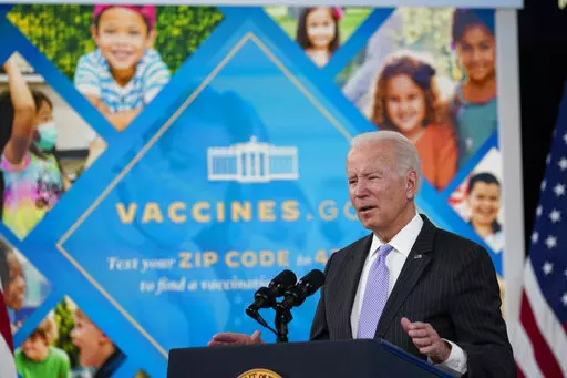 President Joe Biden talks about the newly approved COVID-19 vaccine for children ages 5-11 from the South Court Auditorium on the White House complex in Washington, Wednesday, Nov. 3, 2021.  Millions of health care workers across the U.S. were supposed to have their first dose of a COVID-19 vaccine by this coming Monday, Dec. 6 under a mandate from President Joe Biden's administration. But that has been placed on hold by federal judges. (AP Photo/Susan Walsh, File)