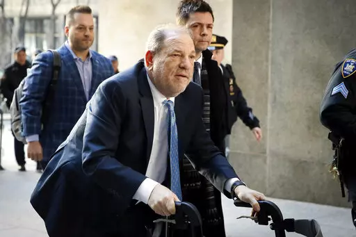 Harvey Weinstein arrives at a Manhattan courthouse as jury deliberations continue in his rape trial in New York, on Feb. 24, 2020. On Monday, Dec. 19, 2022, Weinstein was found guilty of rape at a Los Angeles trial in another #MeToo moment of reckoning, five years after he became a magnet for the movement. (AP Photo/John Minchillo, File)