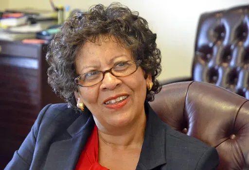 Cynthia Warrick, then-interim president of South Carolina State University, smiles in her office in Orangeburg, S.C., May 8, 2013. Warrick, Stillman College's first female president, has announced plans to retire after leading the Tuscaloosa, Ala.-based historically Black college for five years. The college plans to find her successor by the June 30, 2023, end of Warrick’s contract. (Larry Hardy/The Times and Democrat via AP, File)