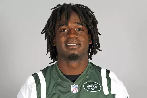 New York Jets running back Joe McKnight is shown in 2013. Louisiana’s Supreme Court has ruled that the man who killed a former NFL player in a New Orleans-area road rage incident cannot be tried again for murder after his conviction on a lesser charge was overturned. Authorities in the New Orleans suburb of Jefferson Parish originally charged Ronald Gasser with second-degree murder in the 2016 shooting of Joe McKnight. (AP Photo/File)