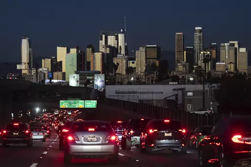 Traffic moves along the 110 Freeway in Los Angeles, Tuesday, Nov. 22, 2022. If the auto industry boosts electric vehicle sales to the level the Environmental Protection Agency recommends, any reduction in pollution could prove more modest than the agency expects. The Associated Press has estimated that nearly 80% of vehicles being driven in the U.S. — more than 200 million — would still run on gasoline or diesel fuel. (AP Photo/Jae C. Hong, File)