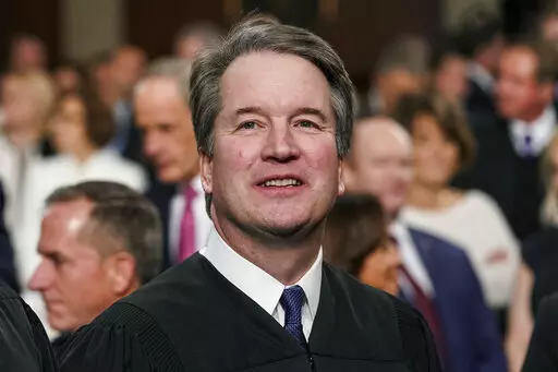 Supreme Court Associate Justice Brett Kavanaugh watches as President Donald Trump arrives to give his State of the Union address to a joint session on Congress at the Capitol in Washington, on Feb. 5, 2019. A new documentary looks into the sexual misconduct allegations against Kavanaugh and raises questions about the depth of the FBI investigation in 2018. “Justice,” from filmmaker Doug Liman, debuted Friday, Jan. 20, 2023, at the Sundance Film Festival to a sold-out theater surrounded by ar