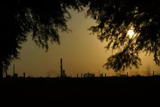 The Denka Performance Elastomer Plant sits at sunset in Reserve, La., on Sept. 23, 2022. The Environmental Protection Agency on Tuesday, April 9, 2024, issued a rule that will force more than 200 chemical plants nationwide to reduce toxic compounds that cross beyond their property lines, exposing thousands of people to elevated cancer risks. The rule will significantly reduce harmful emissions at the Denka Performance Elastomer facility, the largest source of chloroprene emissions in the country