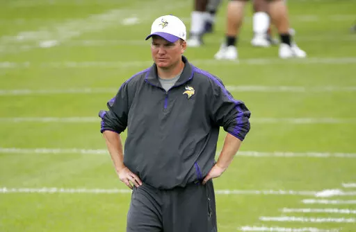 Minnesota Vikings defensive backs coach Adam Zimmer watches practice at an NFL football training camp on the campus of Minnesota State University, Tuesday, July 28, 2015, in Mankato, Minn. The death of Adam Zimmer, a former Minnesota Vikings co-defensive coordinator and the son of former head coach Mike Zimmer, was caused by chronic alcohol use, according to medical examiners.The Hennepin County Medical Examiner’s Office in Minnesota released the finding Friday, Dec. 16, 2022. Zimmer had been 