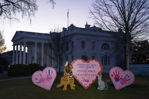 Valentine's Day decorations adorn the White House lawn, Tuesday, Feb. 14, 2023, in Washington. (AP Photo/Evan Vucci)