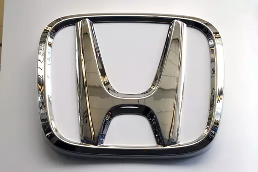 FILE- This Feb. 14, 2019 file photo shows a Honda logo at the 2019 Pittsburgh International Auto Show in Pittsburgh. Honda is recalling a half-million vehicles in the U.S. and Canada, Wednesday, March 15, 2023, because the front seat belts may not latch properly. The recall covers some of the the automaker’s top-selling models including the 2017 through 2020 CR-V, the 2018 and 2019 Accord, the 2018 through 2020 Odyssey and the 2019 Insight. Also included is the Acura RDX from the 2019 and 2020